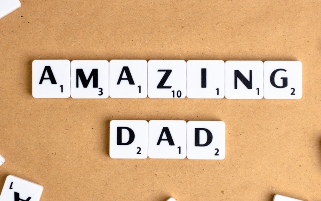 scrabbled letters spelling, "amazing dad"